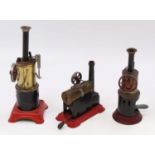 A collection of three various Mamod Fleischmann and Josef Falk vertical and horizontal steam