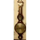 An early 19th century mahogany oversized four-dial wheel barometer