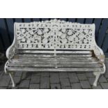 A Coalbrooke style white painted pierced metal, and teak slatted two-seater garden bench, width