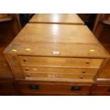 An early 20th century light oak three-drawer canteen of cutlery chest with single locking
