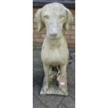 A reconstituted stone garden figure of a seated hound, h.72.5cm