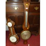 A 19th century mahogany and inlaid two-dial wheel barometer; together with an early 20th century