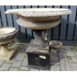 A large painted pottery classical style pedestal footed garden planter, having egg & dart moulded