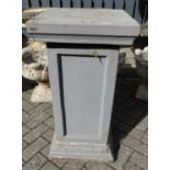 A grey painted reconstituted stone square high garden pedestal, comprised of three sections,