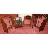Two similar early 20th century walnut triptych dressing mirrors; together with a 19th century