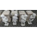A set of four white painted reconstituted stone garden figures, each modelled as cherub musicians