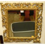 A 19th century Italian Florentine carved giltwood floral decorated rectangular wall mirror (some