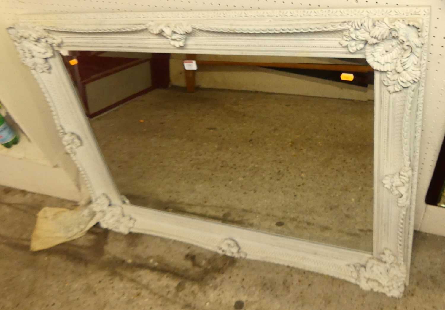 A contemporary grey painted floral decorated bevelled rectangular wall mirror, 80 x 108cm
