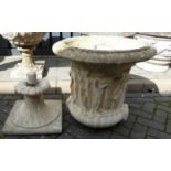 A reconstituted stone pedestal garden urn planter, in the classical taste, the body moulded with
