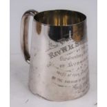 An Edwardian silver presentation mug, of tapered cylindrical shape, engraved 'Presented to the