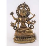 An Asian gilt metal figure of a deity, h.24cm