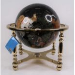 A terrestrial globe, inlaid with polished hardstones, h.41cm