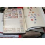 A collection of world stamps and related volumes