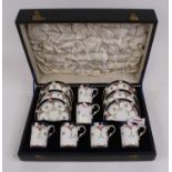 An early 20th century Crescent China six-place coffee service, boxed One can with hairline crack.