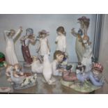 A collection of Lladro and Nao porcelain figures, the largest h.27cm (11)