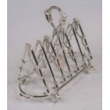 A reproduction novelty silver plated toast-rack, the six divisions in the form of hunting crops