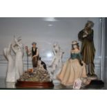 Two Royal Doulton Images series porcelain figure groups, the largest h.24cm; together with a