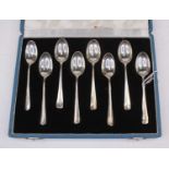 A cased set of eight silver teaspoons in the Old English Rattail pattern displaying hallmarks for