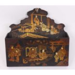 A 20th century black lacquered wall pocket, having chinoiserie gilt decoration, w.24cm