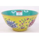 A Chinese porcelain bowl, enamel decorated with flowers, dia.16.5cm