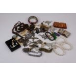 A collection of costume jewellery, to include tiger's eye bracelet, simulated pearl choker, carved