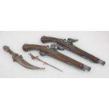 A pair of reproduction flintlock pistols, each 38cm; together with a dagger and a letter-opener (4)