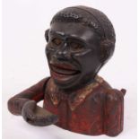 A figural novelty money-box, h.13.5cm These items are listed on the basis they are illustrative of a