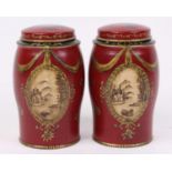 A pair of reproduction red toleware canisters, h.7.5cm