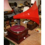 A reproduction gramophone, having a large red painted trumpet, overall h.71cm