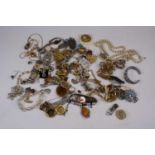 A collection of various costume jewellery, to include hardstone set filigree white metal brooch,