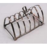A George V silver six-division toast-rack of arched shape, Deakin & Francis, Birmingham 1932, 2.