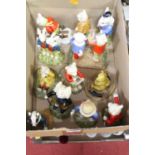 A collection of Royal Doulton Rupert character figures, the largest h.14cm Archer Rupert has flaky