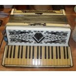A vintage Pearloid Giraldo piano accordion, w.52cm
