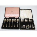 A set of six Elizabeth II silver teaspoons, each having stylised decoration to the terminal, Atkin