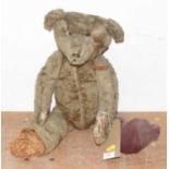 A vintage blond mohair teddy bear, having glass eyes and jointed limbs Height approx. 50cm.Very