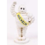 A cast iron model of the Michelin Man, h.17cm