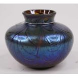 A Loetz style iridescent glass vase, height 11cm