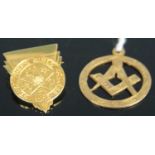 A 9ct gold Masonic pendant, 3.1g; together with a yellow metal girl's school badge, annotated for St