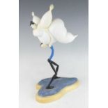 Sarah Jane Szikora - Swan lake, painted resin novelty sculpture, 2004, this example numbered '152/