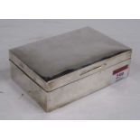 An Edwardian silver-clad table cigarette box, of rectangular form, having a cedar lined interior,