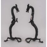 A pair of modern Chinese metal models of dragons, each h.40cm