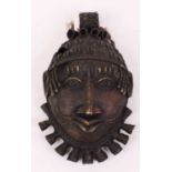 An African gilt metal mask, possibly Benin, h.27cm