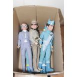 A collection of five Thunderbirds action figures