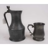An 18th century pewter tappit hen, having acorn thumbrest, h.26cm; together with a pewter tankard (