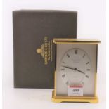 A Garrard & Co. quartz brass cased mantel clock, height 13cm, boxed