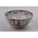 An 18th century Lowestoft porcelain slop bowl, polychrome enamel decorated with figures before a