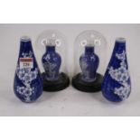 A pair of Chinese vases in the blue & white prunus pattern of teardrop shape, height 15cm,