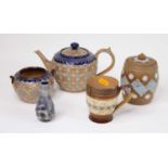 A collection of Royal Doulton stoneware, to include a teapot, biscuit barrel and tankard