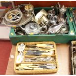 A box of silver plated items to include teapots, table cigarette box and cutlery