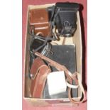 A collection of photography equipment to include a Polaroid Supercolour Swinger 2 camera Kodak and